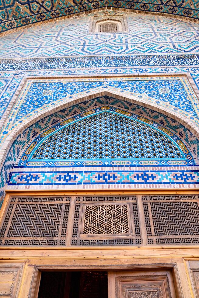 Samarkand, Uzbekistan-august 12, 2023-Particular of the Registan square occupied by a large complex made up of 3 madrasas photo