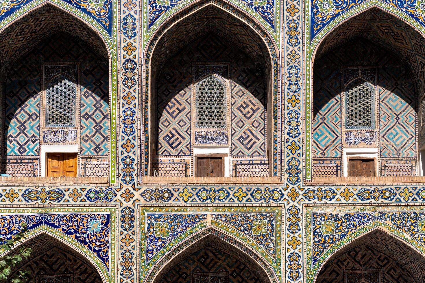Samarkand, Uzbekistan-august 12, 2023-particular inside the historic Madrasas in the Registan square during a sunny day photo