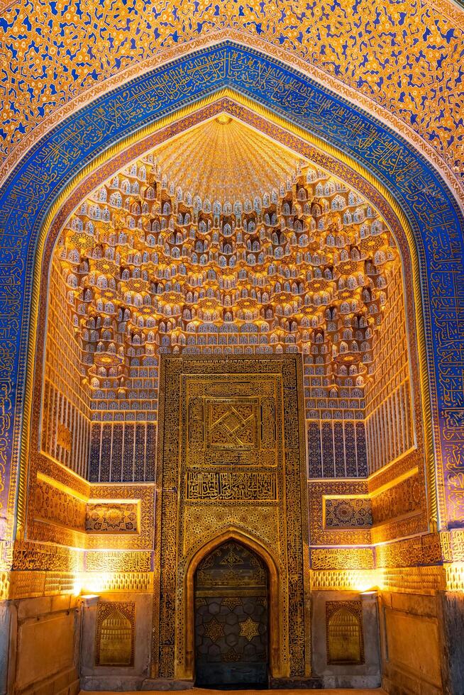 Samarkand, Uzbekistan-august 12, 2023-Interior of the Tilla-Kari Mosque in the Registan Square in Sammarkand during summer day photo