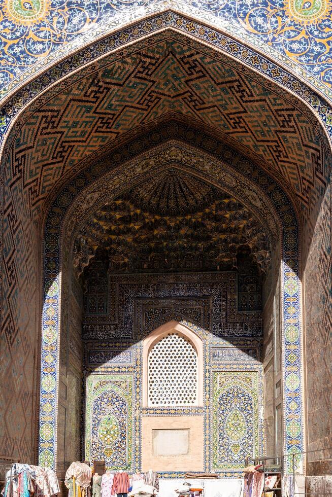 Samarkand, Uzbekistan-august 12, 2023-particular inside the historic Madrasas in the Registan square during a sunny day photo