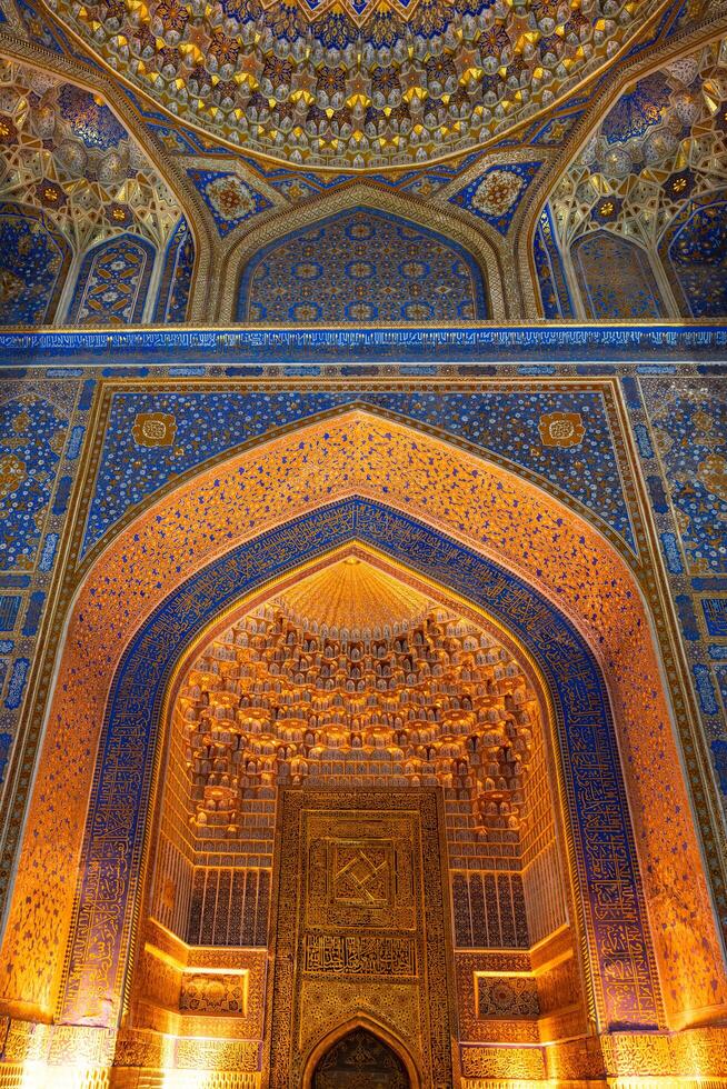 Samarkand, Uzbekistan-august 12, 2023-Interior of the Tilla-Kari Mosque in the Registan Square in Sammarkand during summer day photo