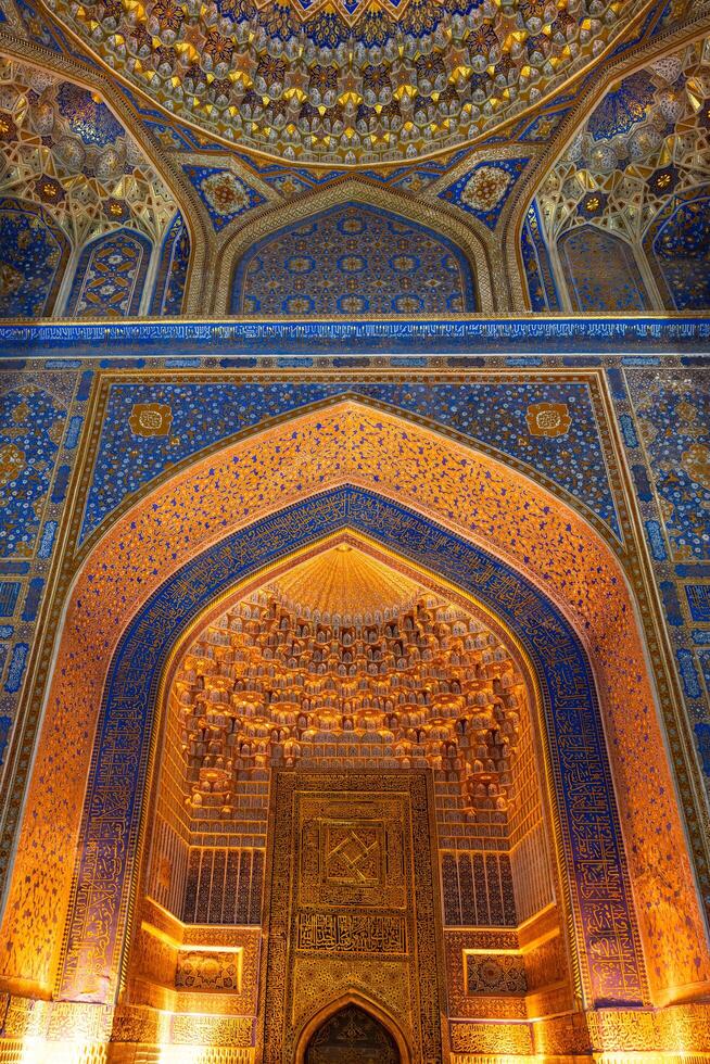 Samarkand, Uzbekistan-august 12, 2023-Interior of the Tilla-Kari Mosque in the Registan Square in Sammarkand during summer day photo