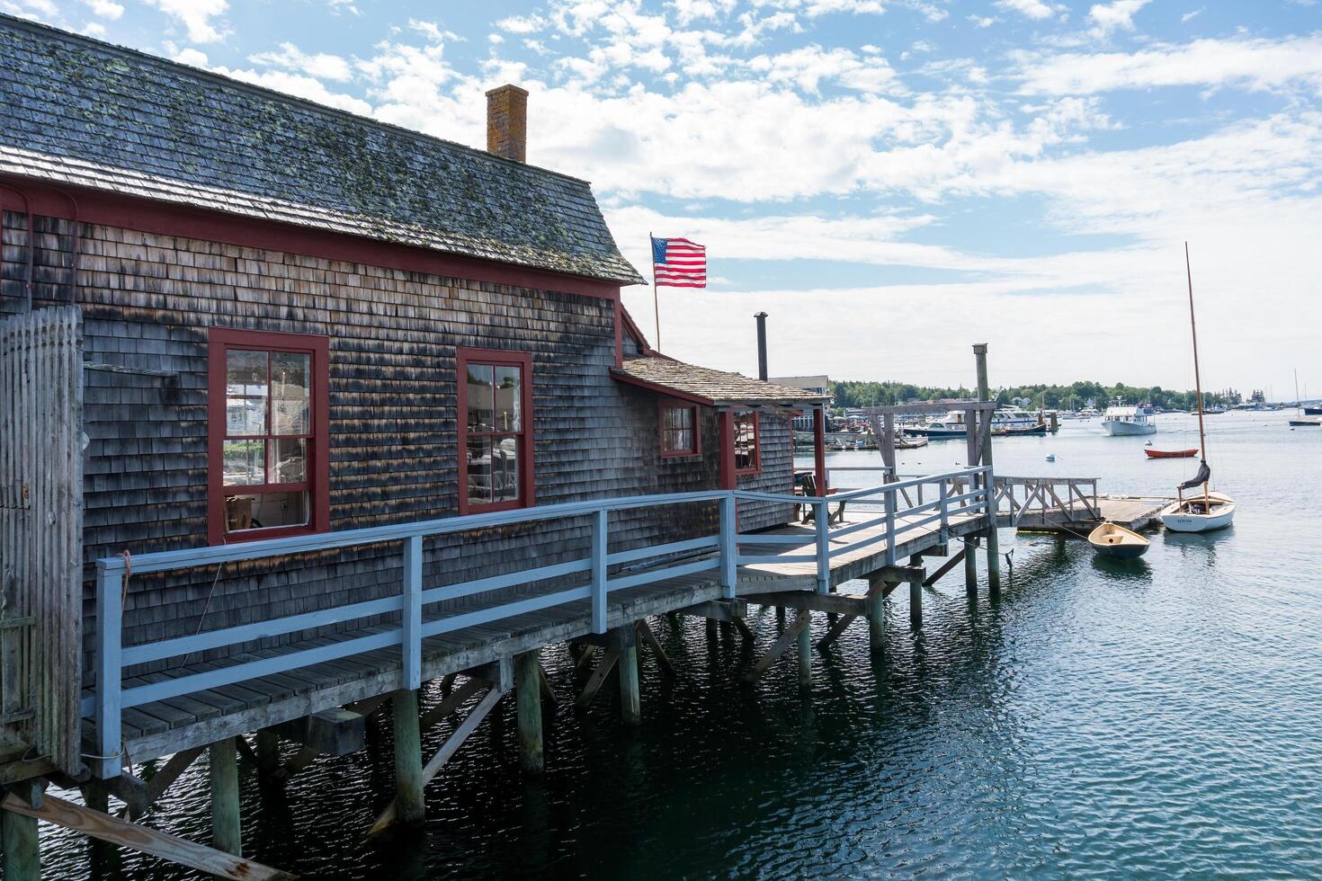 Boothbay, USA - August 14, 2019-Walking through the streets of Boothbay in Maine on a sunny day photo