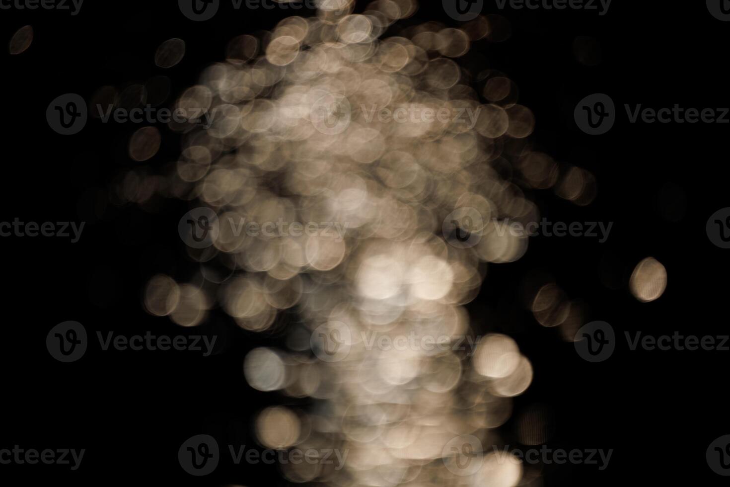 Blurred bokeh with sparkling water glitter with cool mist flash effect photo