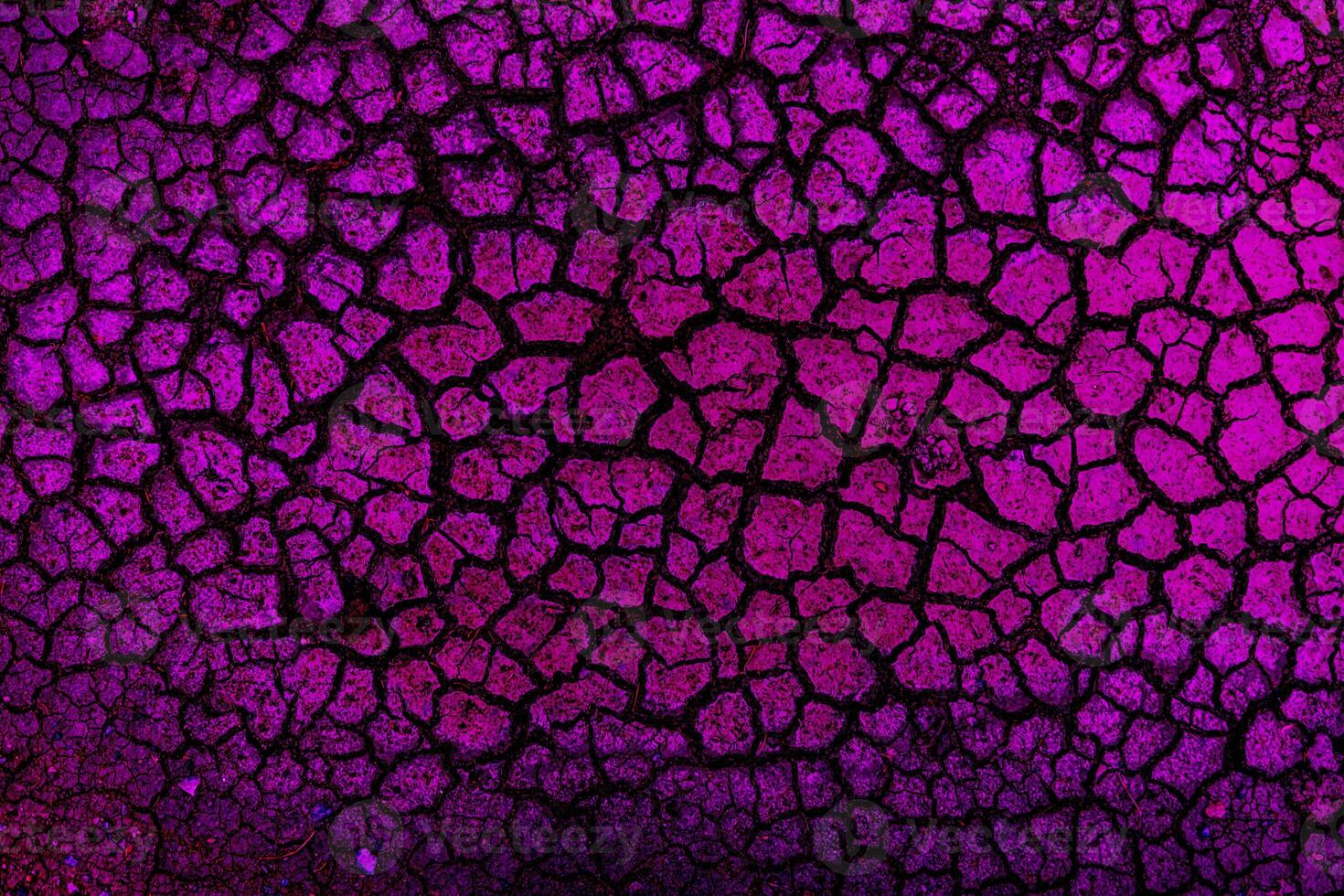 Earth with cracks top view for background or graphic design of textures and overlays with the concept of drought and death. photo