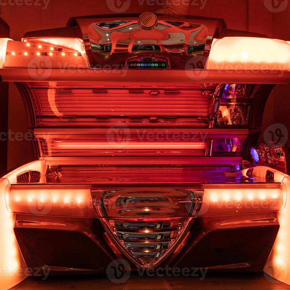 Bed solarium with red color photo