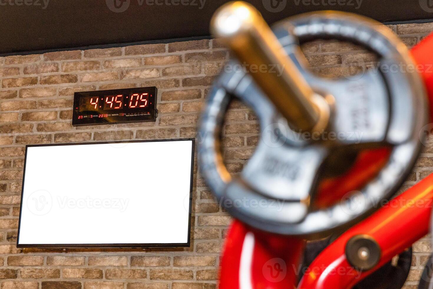 Barbell at workout gym, wall clock photo