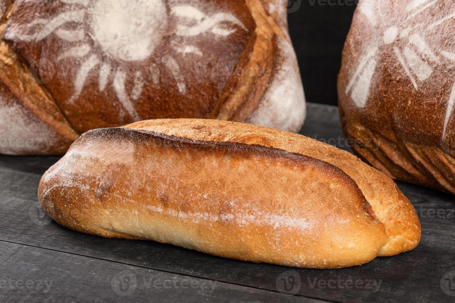 Tasty breads, loaves close up photo