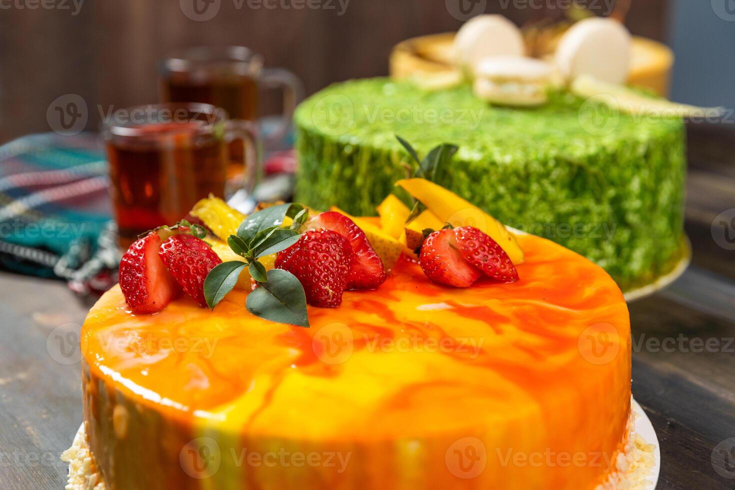 Beautiful strawberry cake on the wooden table photo