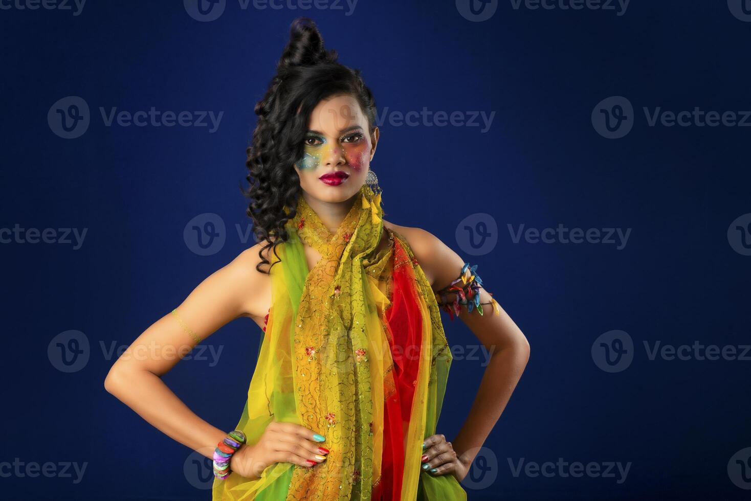 A gorgeous Young model beautiful woman or girl with perfect art creative makeup like a butterfly. photo