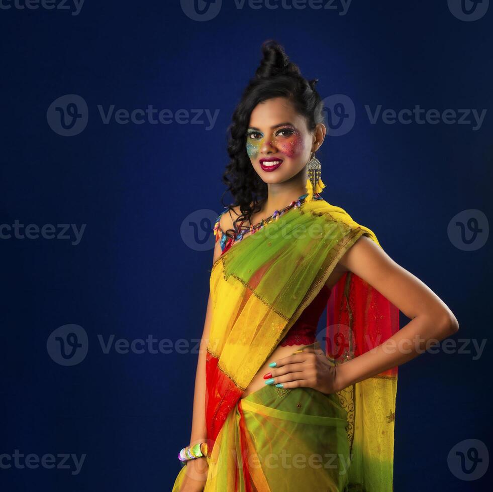 A gorgeous Young model beautiful woman or girl with perfect art creative makeup like a butterfly. photo