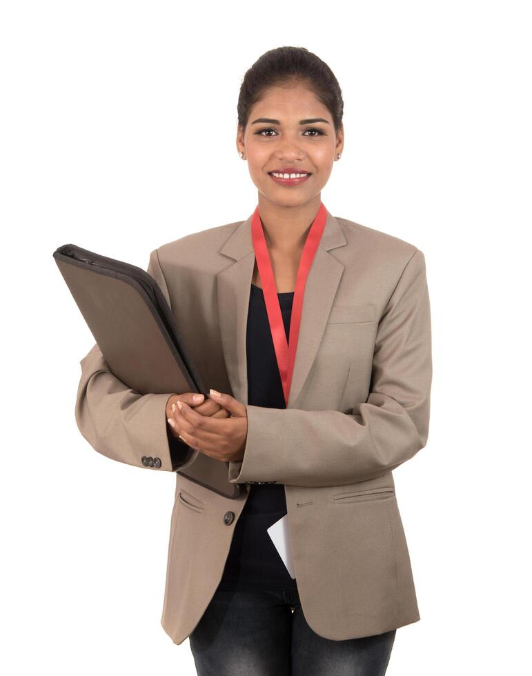 Young happy business woman holding folder photo