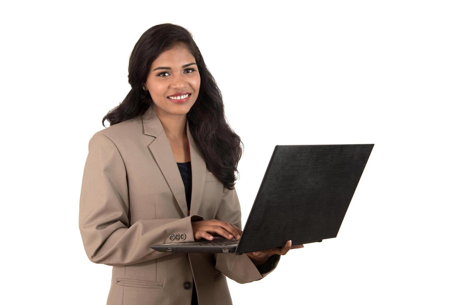 Young happy smiling woman holding laptop. photo