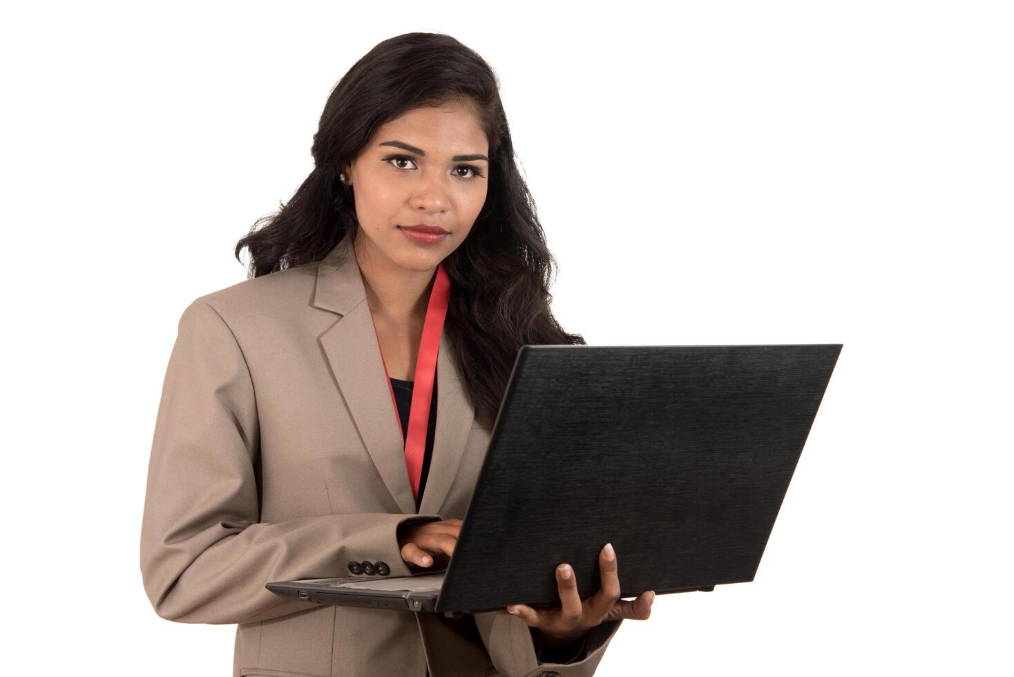 Young happy smiling woman holding laptop. photo