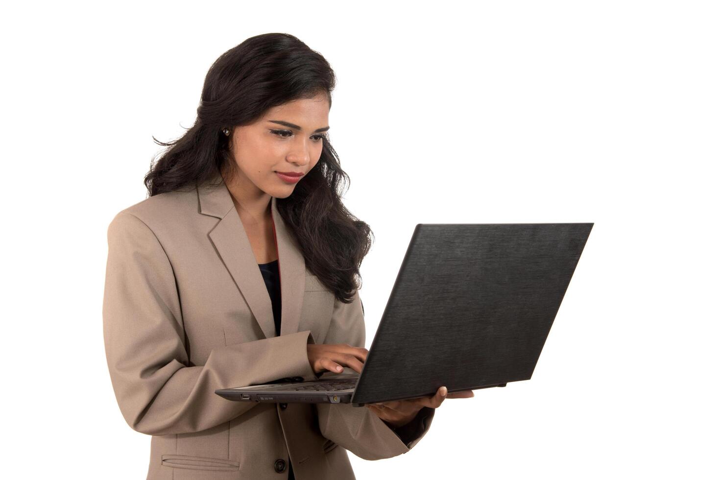 Young happy smiling woman holding laptop. photo