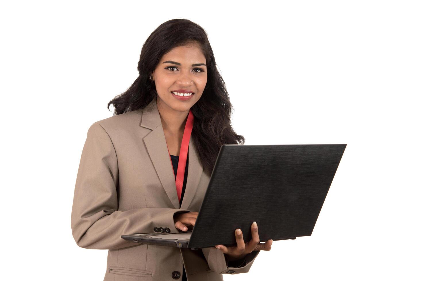 Young happy smiling woman holding laptop. photo