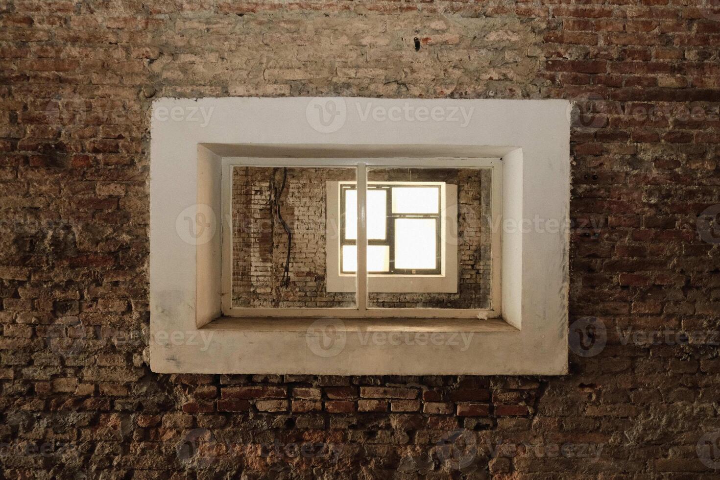 Window Within a Window Rustic Brick Interior photo