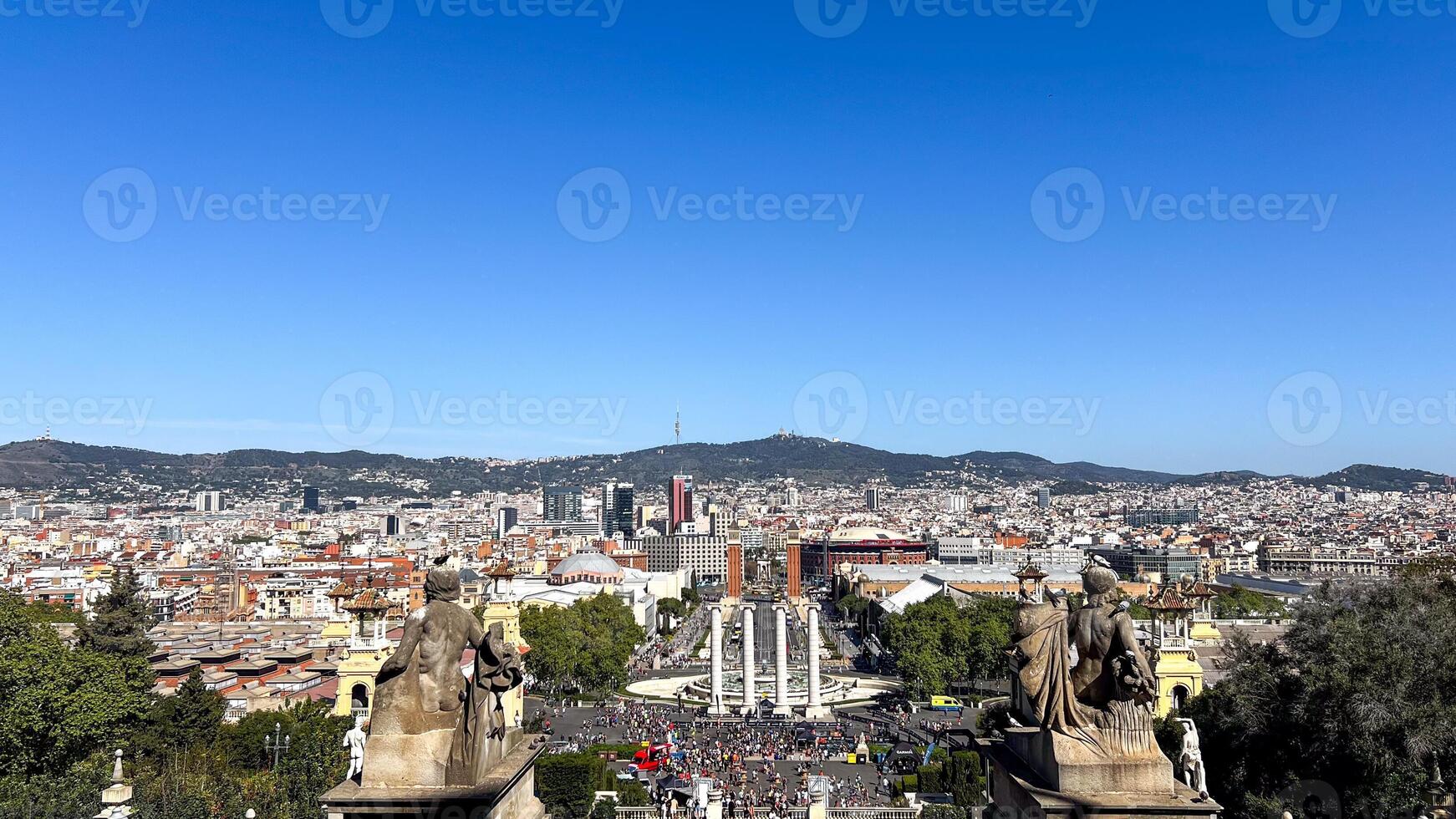 Aerial view of Barcelonas cityscape showcasing Montjuic and the National Palace, ideal for travel and cultural tourism during festivals photo