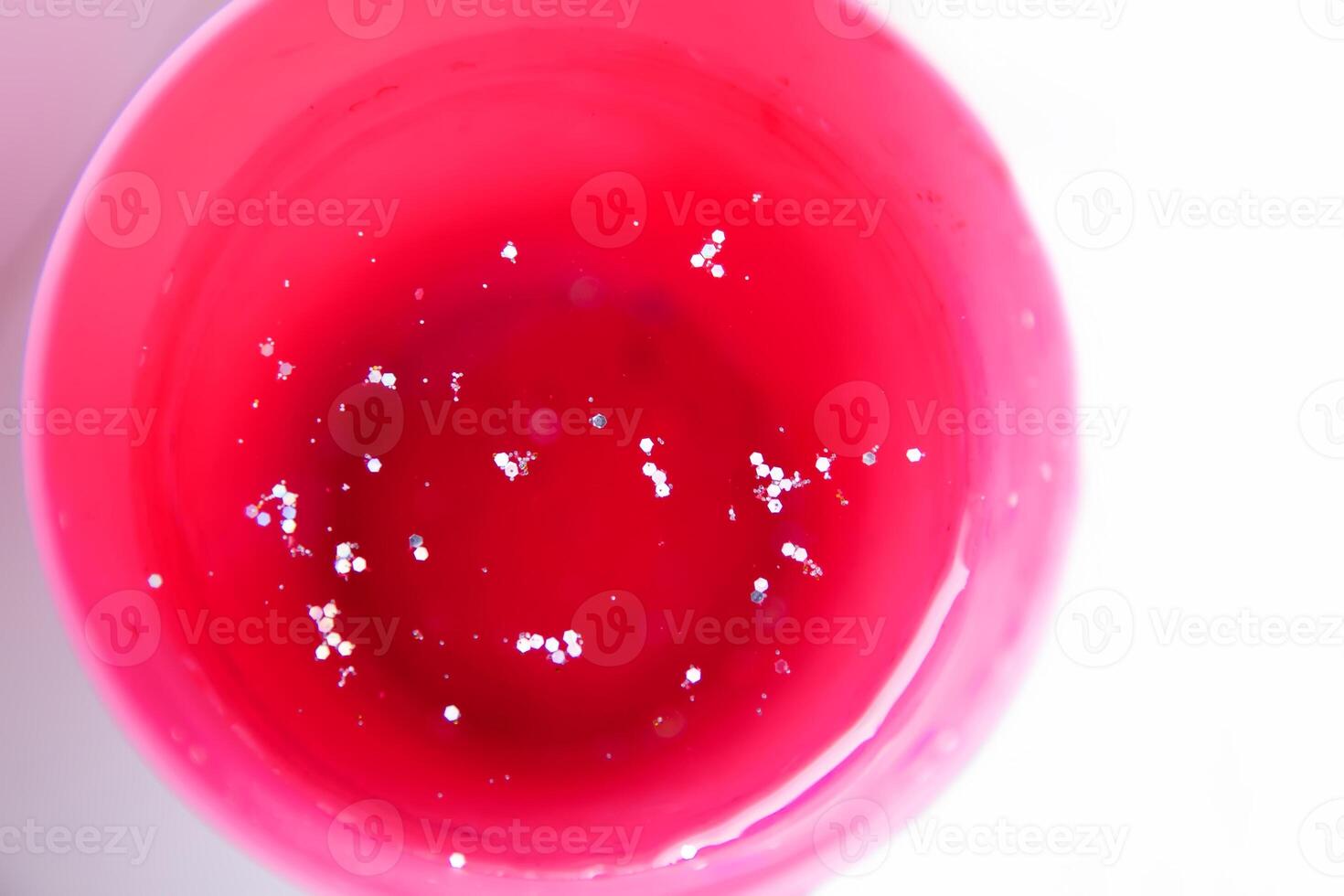 Colorful ice with glitters. Winter kid's activities. photo