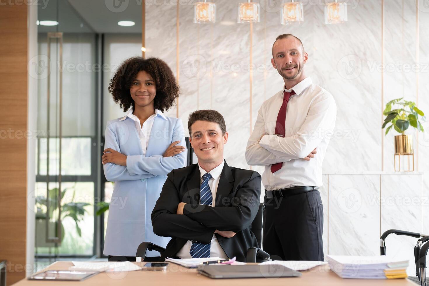 Confident diverse business team posing at office desk, Concept of professionalism photo
