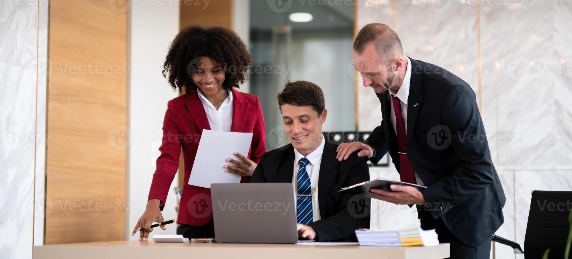 Diverse business team collaborating at office desk, Concept of teamwork photo