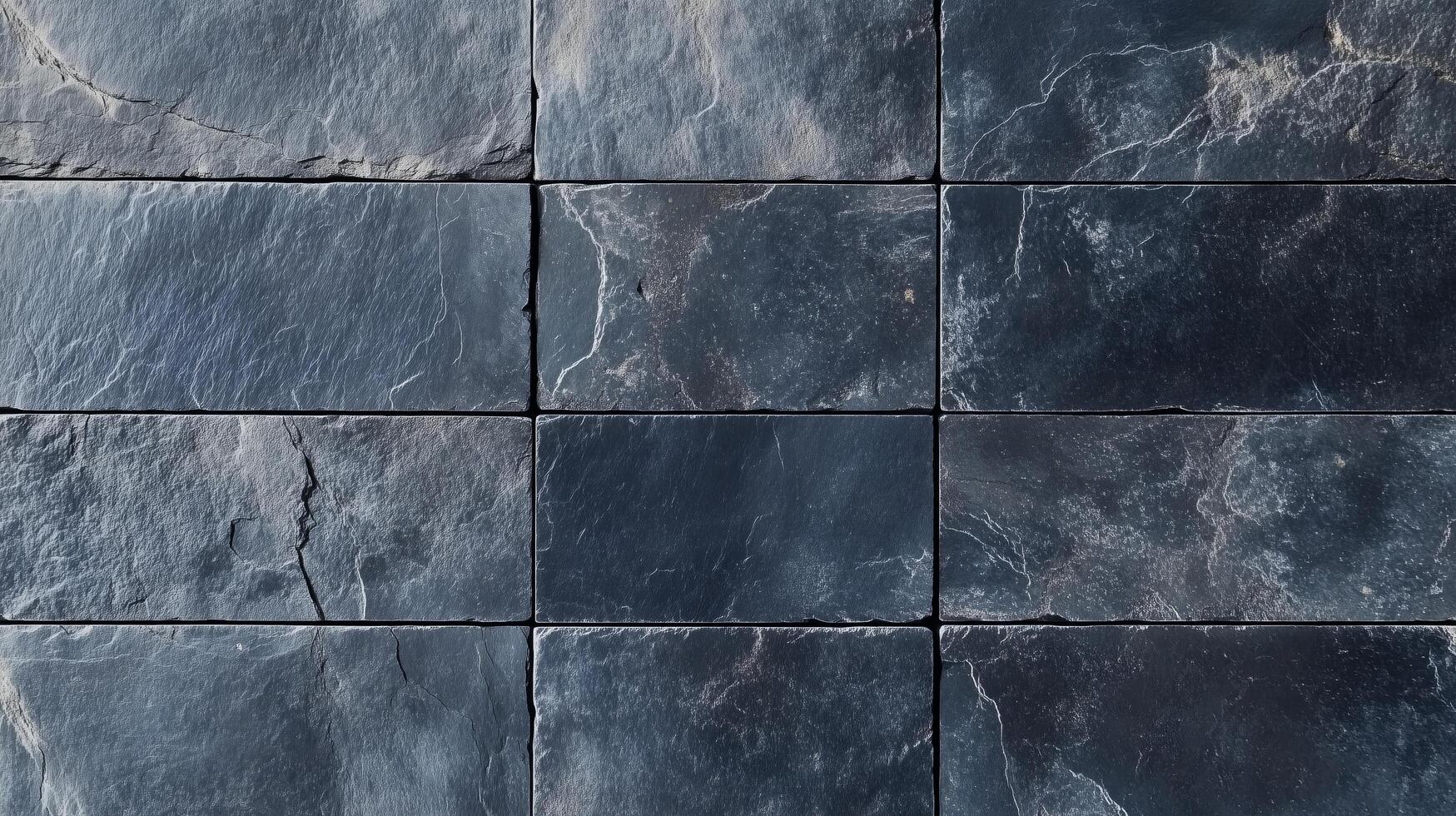 A black and brown tile with a rustic look. The tiles are square and are laid out in a row. photo
