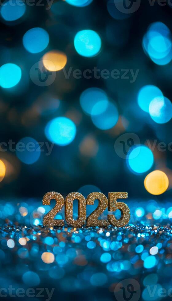 The number 2025 in golden font placed on a glittering, festive surface with blurred blue bokeh lights in the background photo