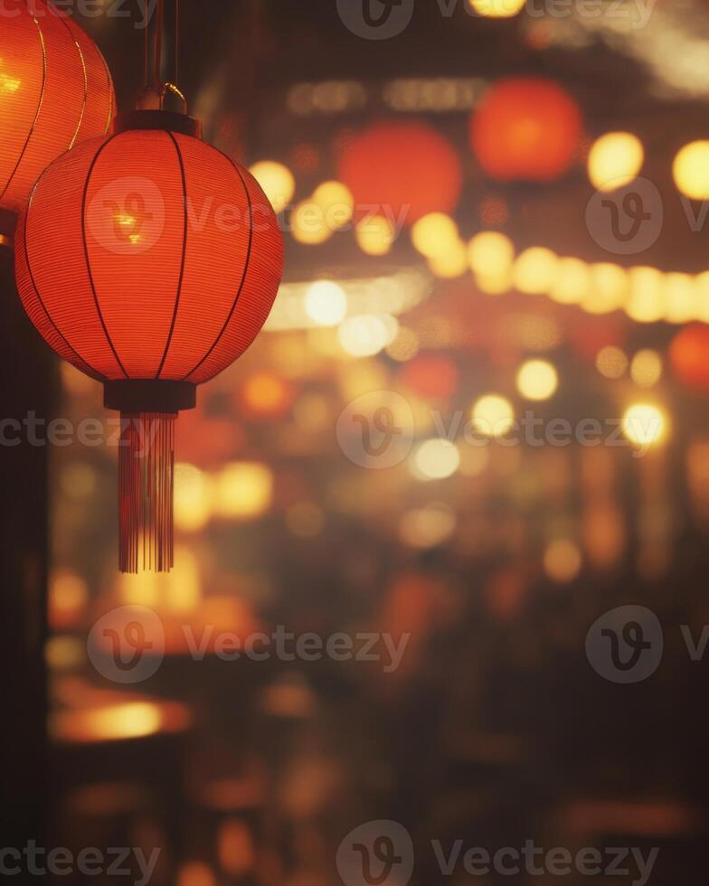 Vibrant red lanterns swaying gently, surrounded by blurry lights and a festive crowd in the background, glowing softly under warm lighting photo