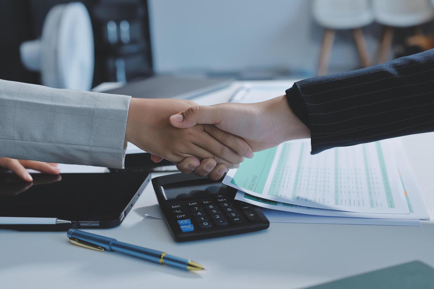 Business handshake for teamwork of business merger and acquisition,successful negotiate,hand shake,two businessman shake hand with partner to celebration partnership and business deal concept photo