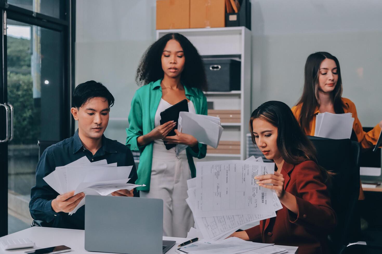 Stress, business people and employee frustrated with multitasking, pressure or overworked by team in chaos with paperwork. Anxiety, headache and worker overwhelmed by group and burnout in crisis photo