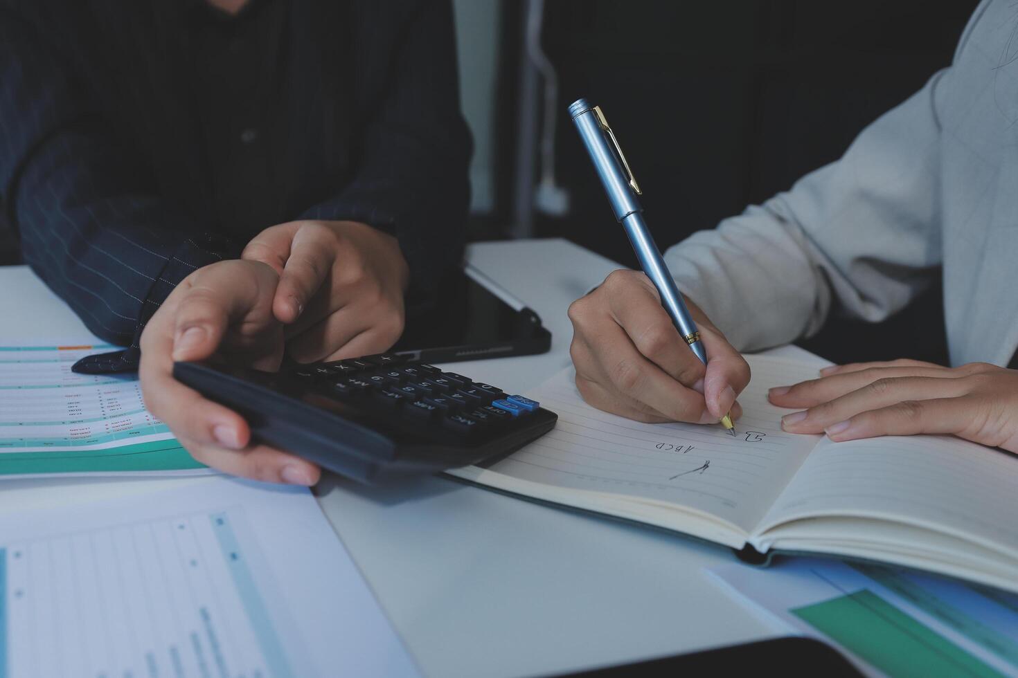 Team of business people are meeting to analyze data for marketing plan,Market research reports and income statistics, Financial and Accounting concept. photo