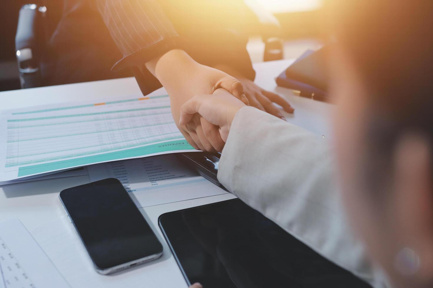 Business handshake for teamwork of business merger and acquisition,successful negotiate,hand shake,two businessman shake hand with partner to celebration partnership and business deal concept photo