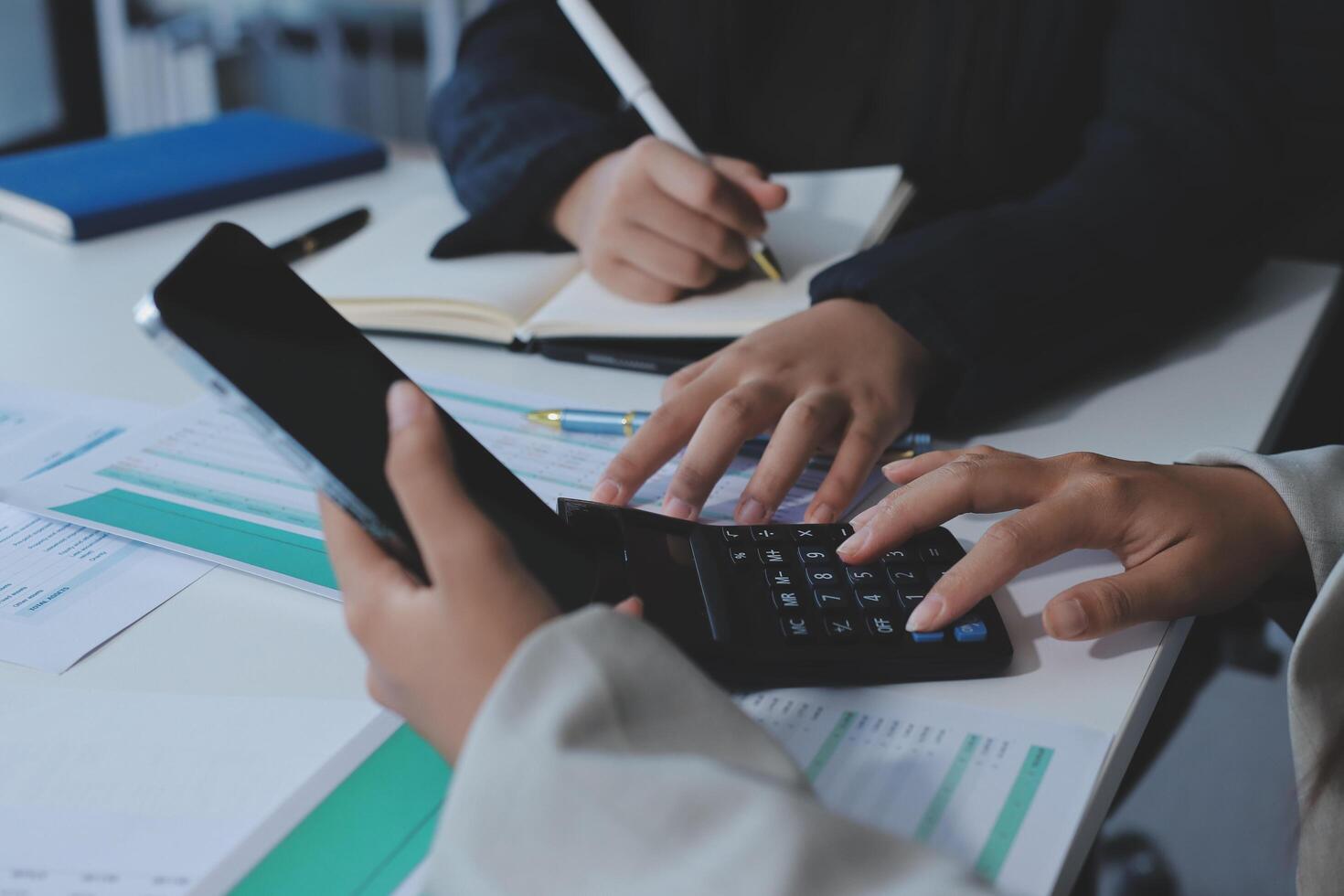 Team of business people are meeting to analyze data for marketing plan,Market research reports and income statistics, Financial and Accounting concept. photo