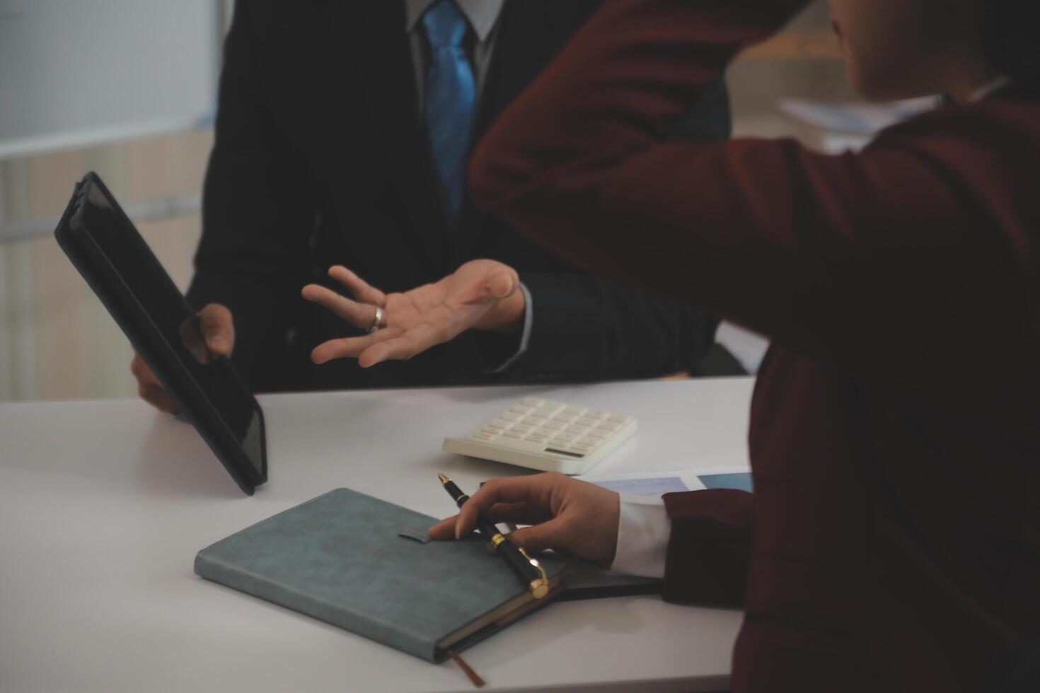 Audit concept,Administrator business man financial inspector and secretary making report calculating balance. Internal Revenue Service checking document. photo