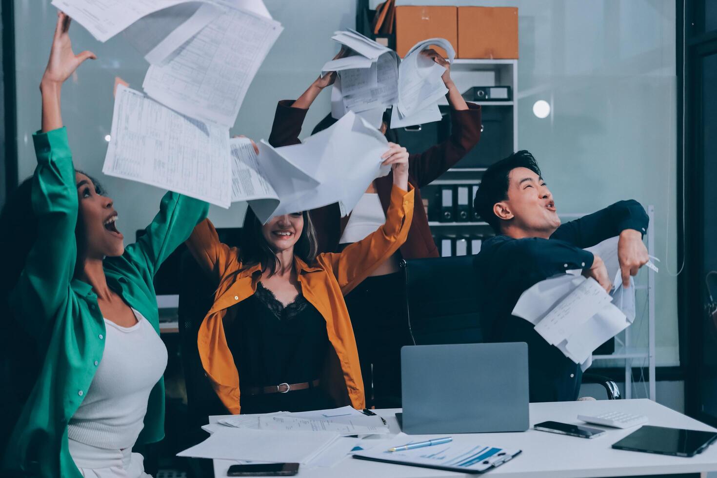 Motivated funny diverse business team people dancing celebrating success at corporate party on friday, happy friendly multiracial coworkers group having fun together enjoy victory dance in office photo