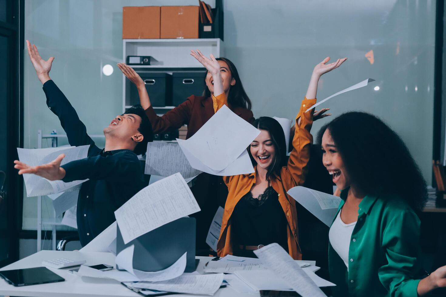 Motivated funny diverse business team people dancing celebrating success at corporate party on friday, happy friendly multiracial coworkers group having fun together enjoy victory dance in office photo