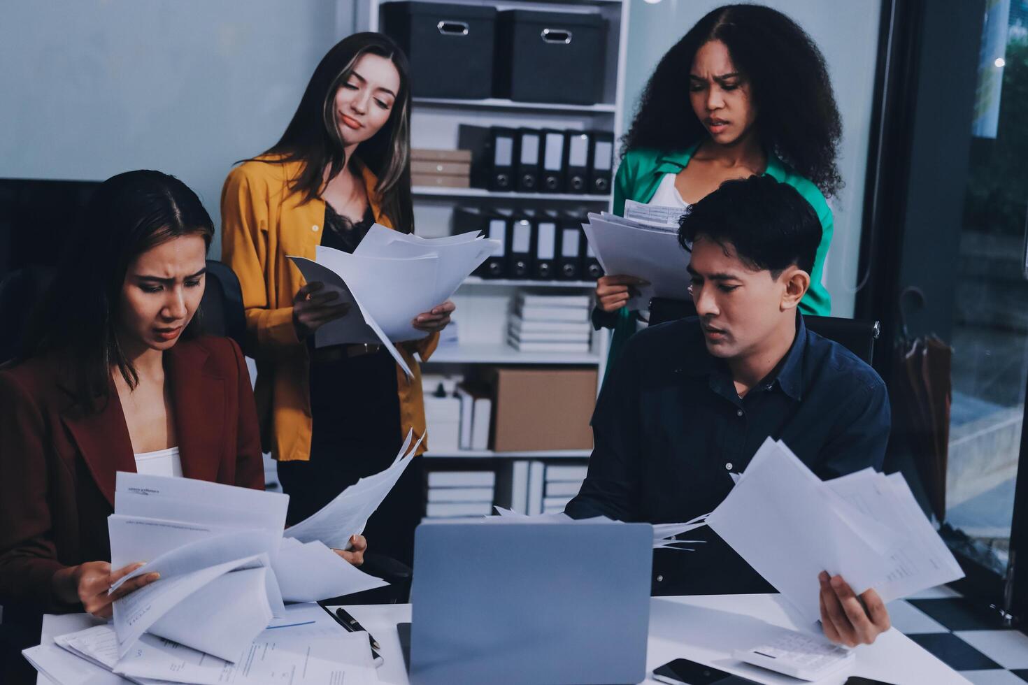 Stress, business people and employee frustrated with multitasking, pressure or overworked by team in chaos with paperwork. Anxiety, headache and worker overwhelmed by group and burnout in crisis photo