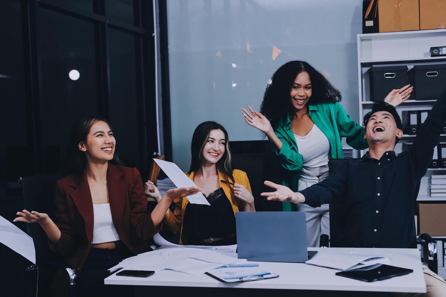 Motivated funny diverse business team people dancing celebrating success at corporate party on friday, happy friendly multiracial coworkers group having fun together enjoy victory dance in office photo