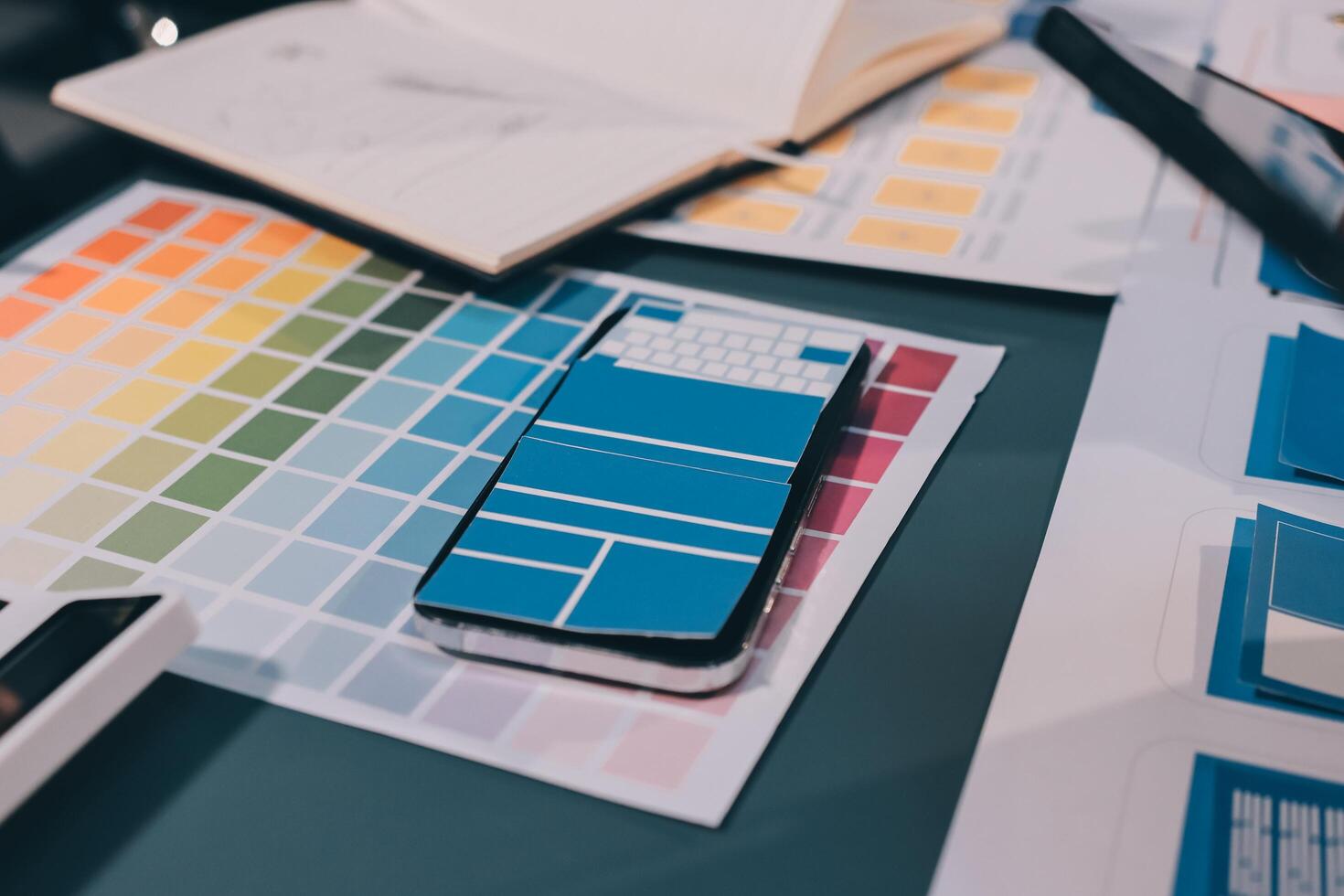The designer team is designing the uxui system to make the uxui system work well on new phones and support system updates. Website development concept UI UX front end designer photo