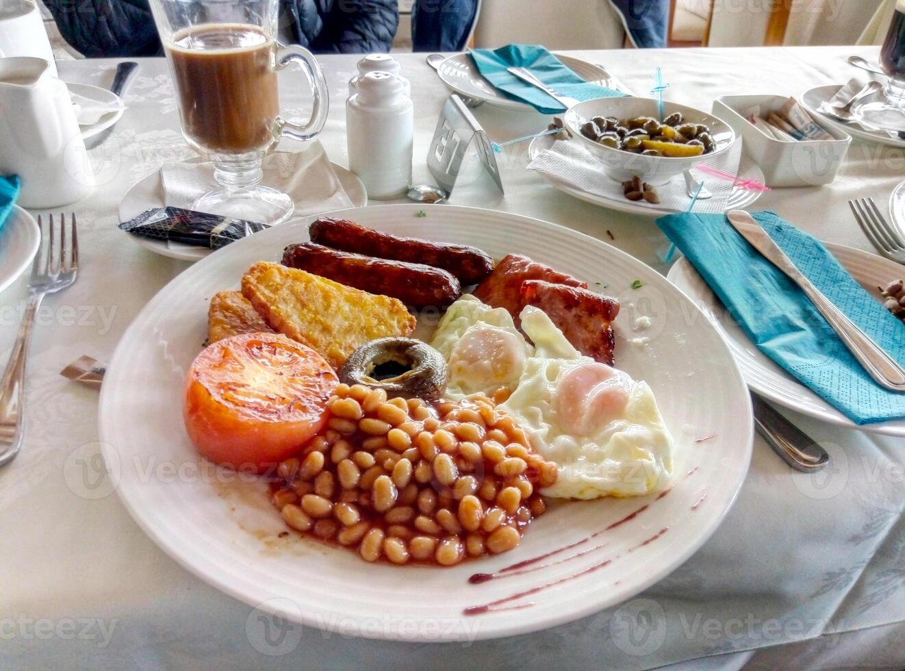Full English breakfast on a plate outdoor cafe photo
