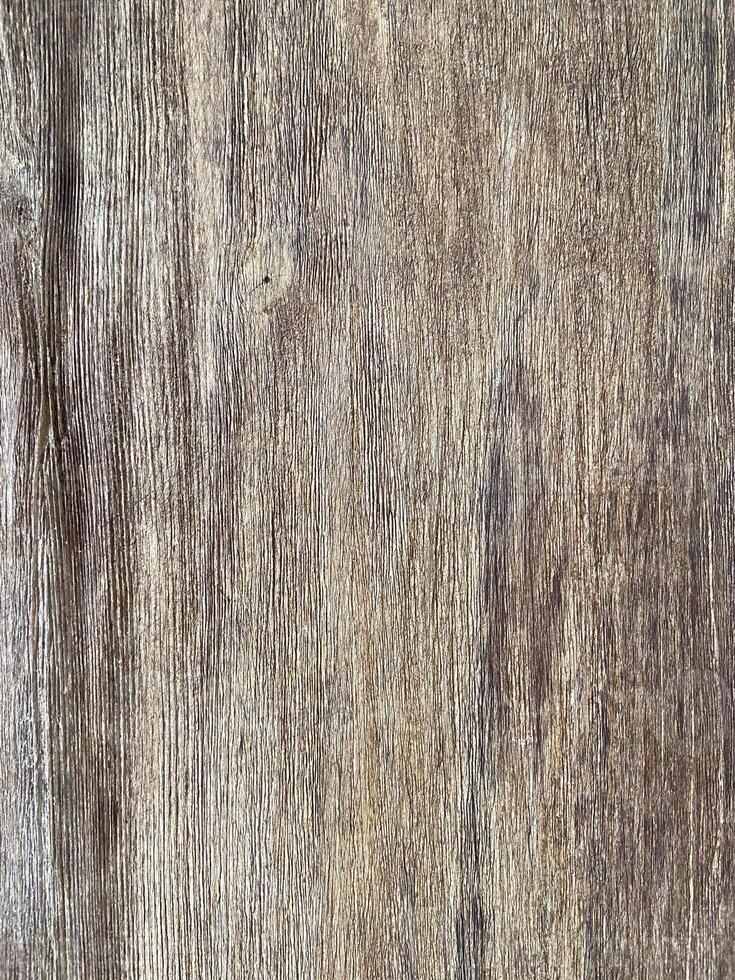Rustic wooden panel leans gracefully against a textured, showcasing its rich grain patterns and natural warmth, background photo