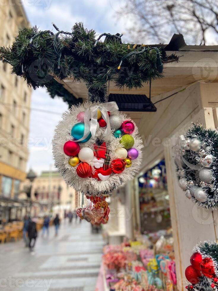 Decor on a festive Christmas market stall. Vibrant array of sweets. Inviting and cheerful atmosphere winter holidays. photo