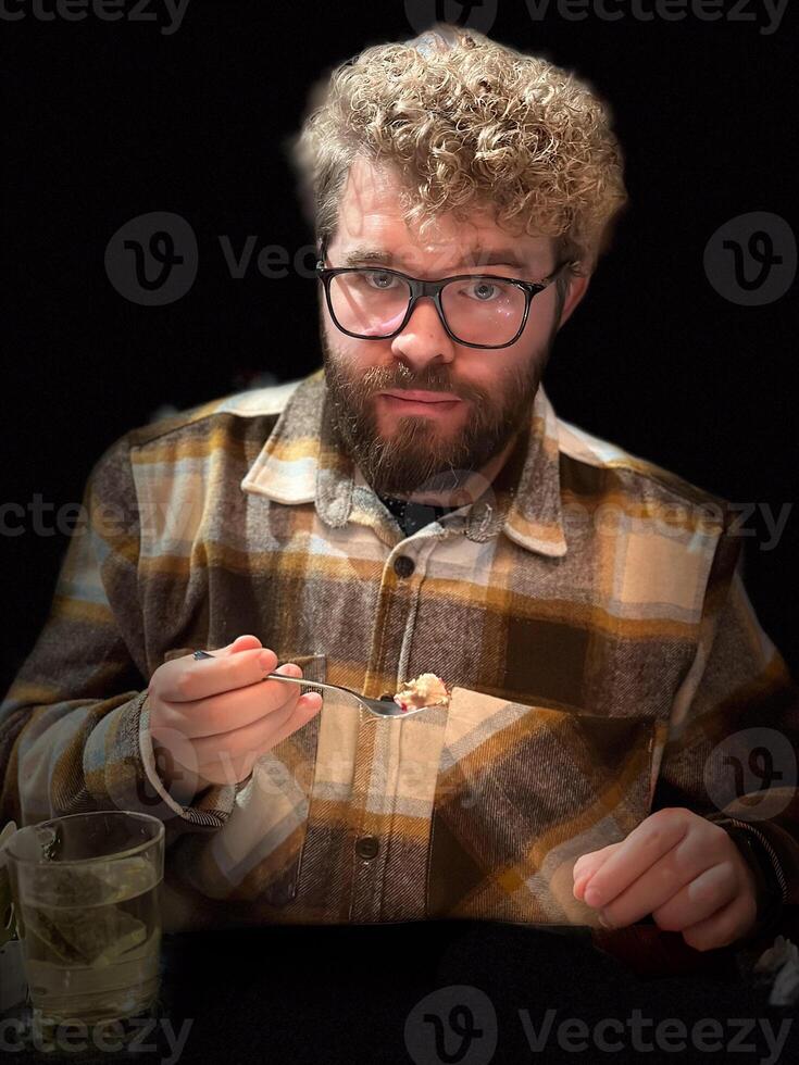 Millennial man casual dining experience with cozy flannel shirt and warm beverage in a relaxed setting, emphasizing the simple joys of eating out photo