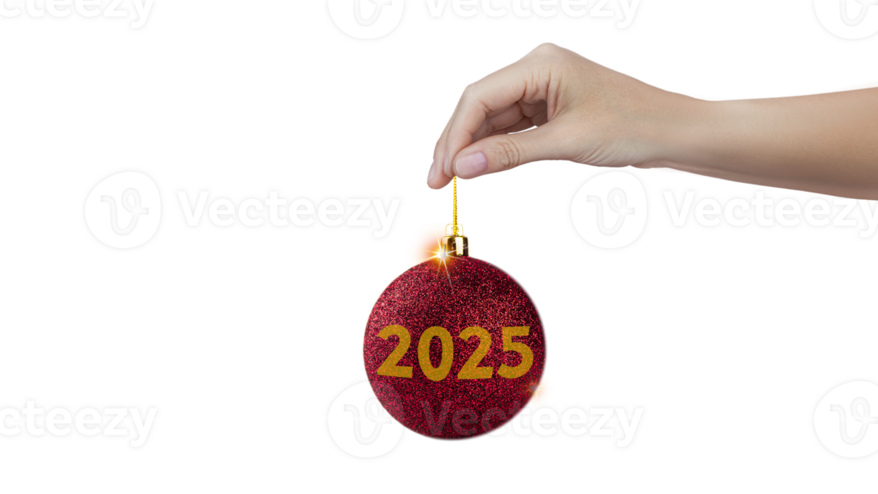 A woman's hand holds a red shiny Christmas tree ball with the inscription 2025 isolated on white png
