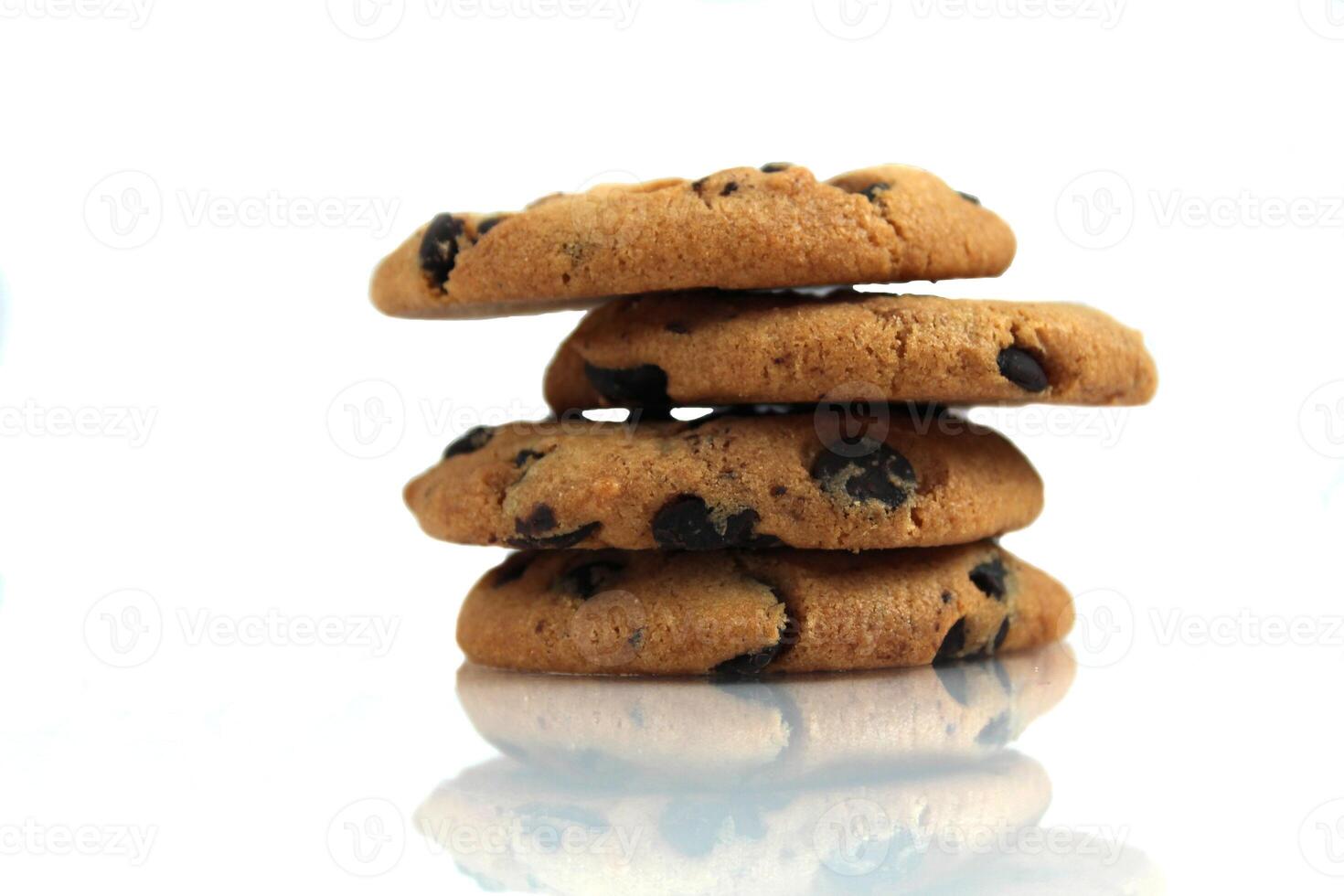 Chocolate Chip Cookies stacked on a white background with space for copyspace text. Chocolate Biscuit Isolate photo