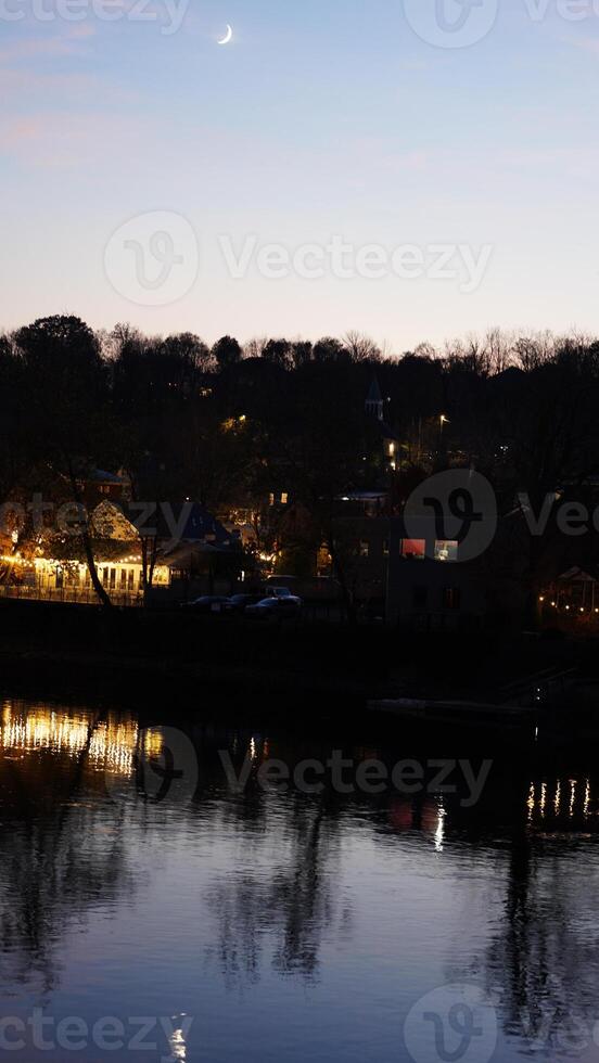 The beautiful sunset view with the colorful sky and river as background in a little USA town photo