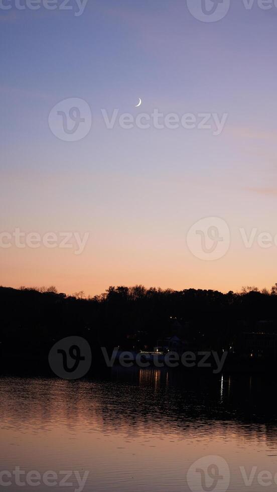 The beautiful sunset view with the colorful sky and river as background in a little USA town photo