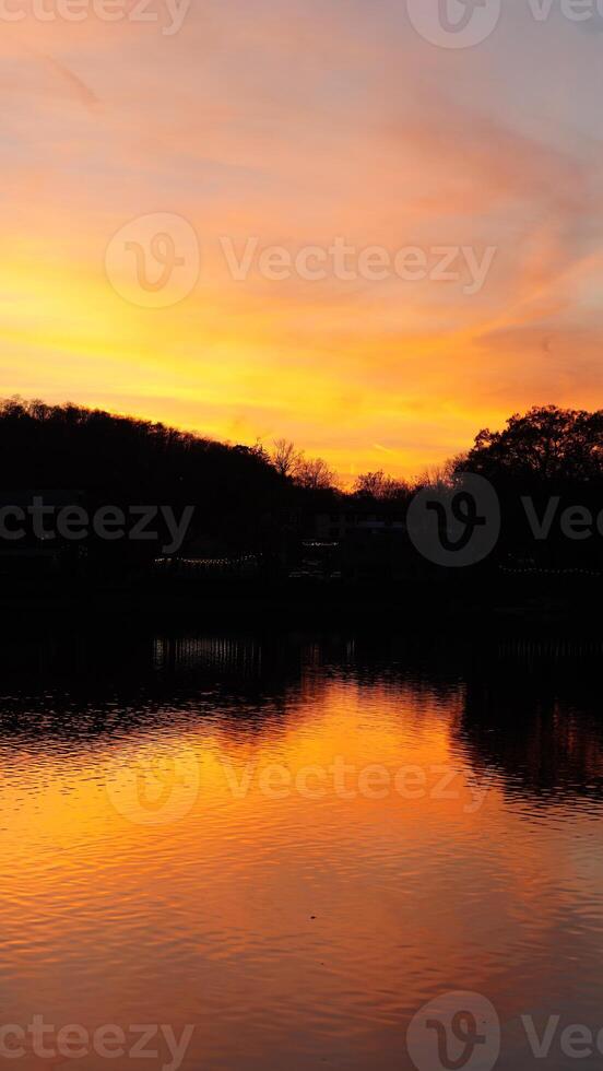 The beautiful sunset view with the colorful sky and river as background in a little USA town photo
