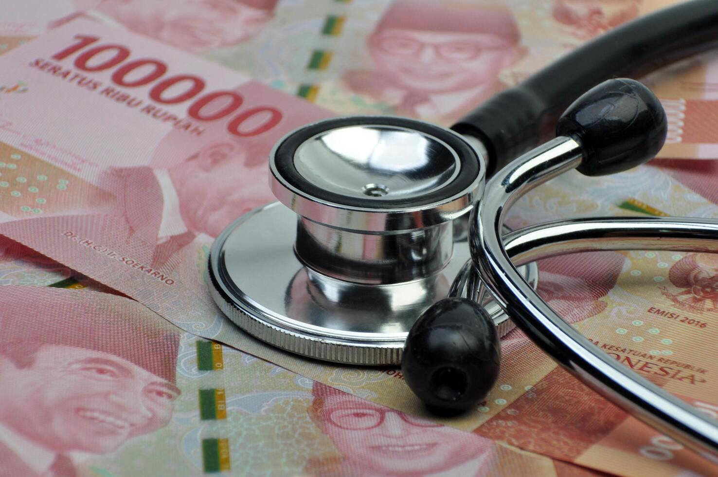 Medical Stethoscope and Indonesia Money Rupiah Image Stock photo