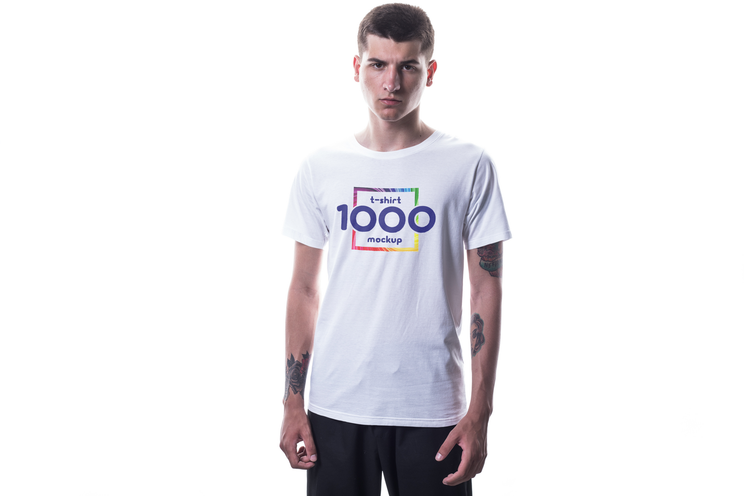 Young man wearing a white t-shirt with a colorful square design. psd